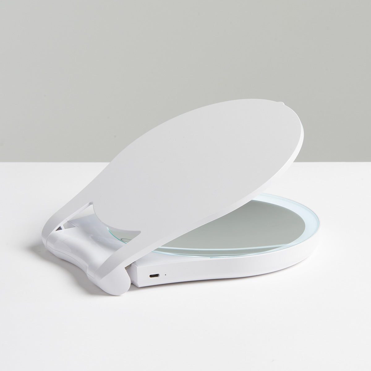 10X Lighted Folding Travel Mirror by Sharper Image